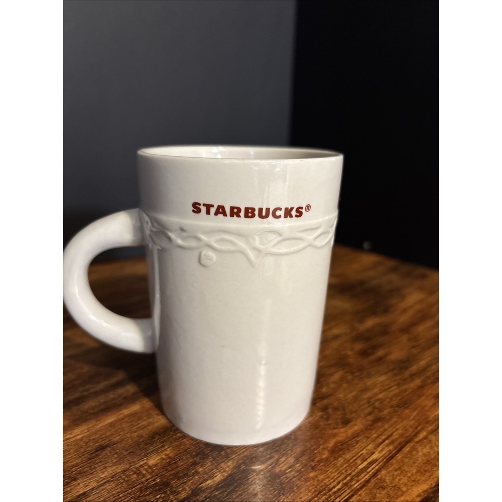 Starbucks 2010 white w/embossed detail 10oz coffee mug cup